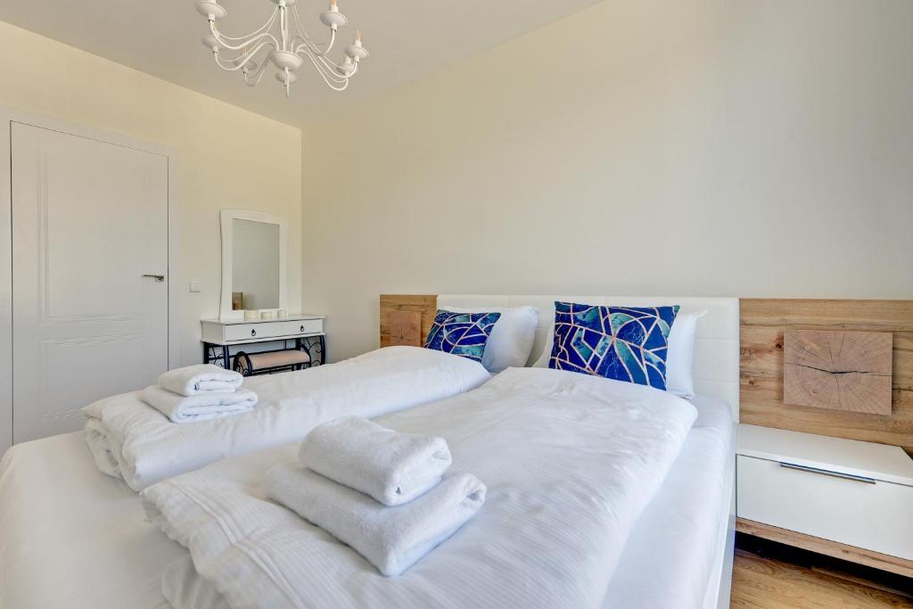 Posteľ alebo postele v izbe v ubytovaní Comfort Apartments Dolny Sopot