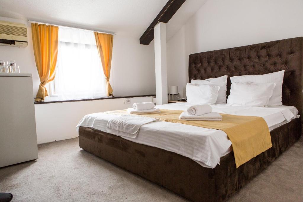 Säng eller sängar i ett rum på Attico Spa