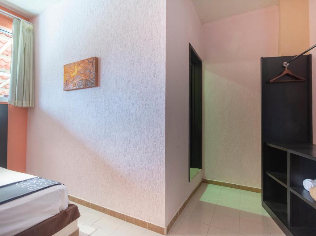 Postel nebo postele na pokoji v ubytování Hotel Spa Shalam