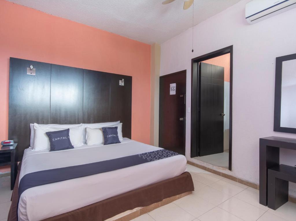 Postel nebo postele na pokoji v ubytování Hotel Spa Shalam