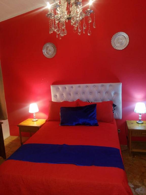 Postel nebo postele na pokoji v ubytování Hotel El Tronco Inc