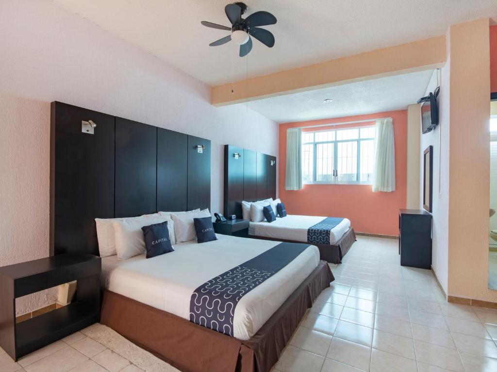 Postel nebo postele na pokoji v ubytování Hotel Spa Shalam