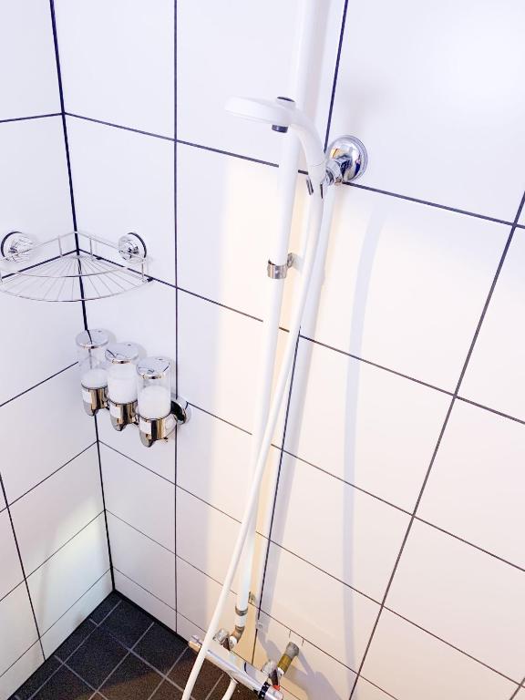 Koupelna v ubytování Otohaya Guesthouse