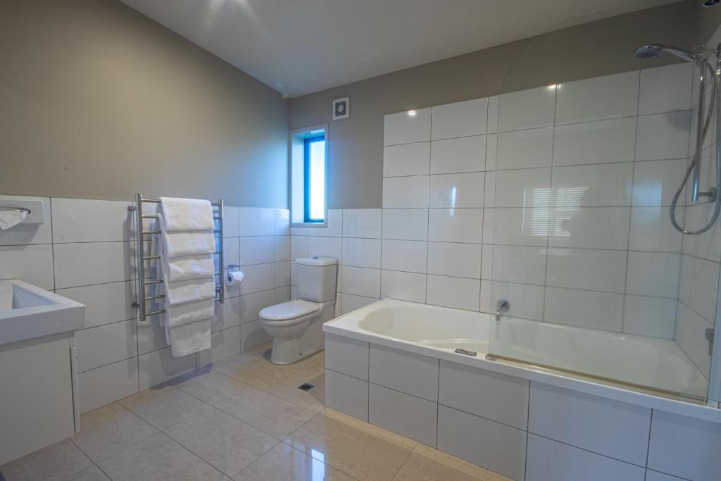 Koupelna v ubytování Amity Court Motel