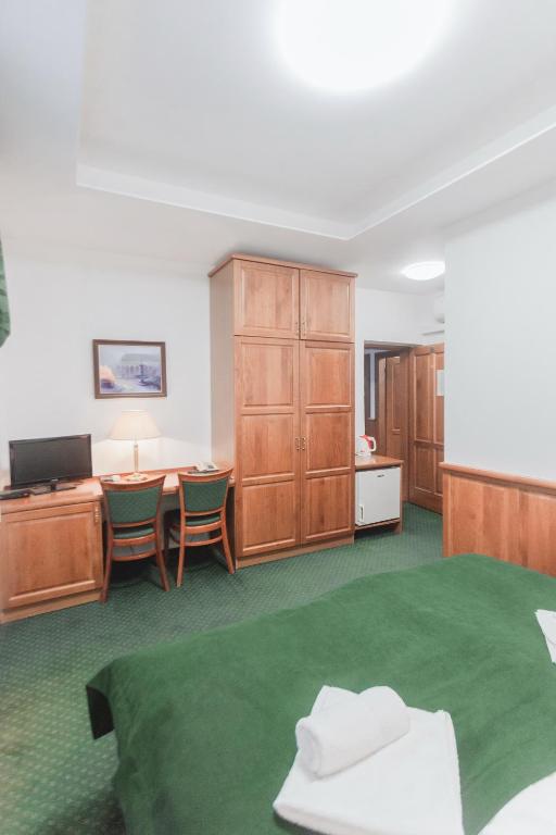 TV a/nebo společenská místnost v ubytování Hotel Peko