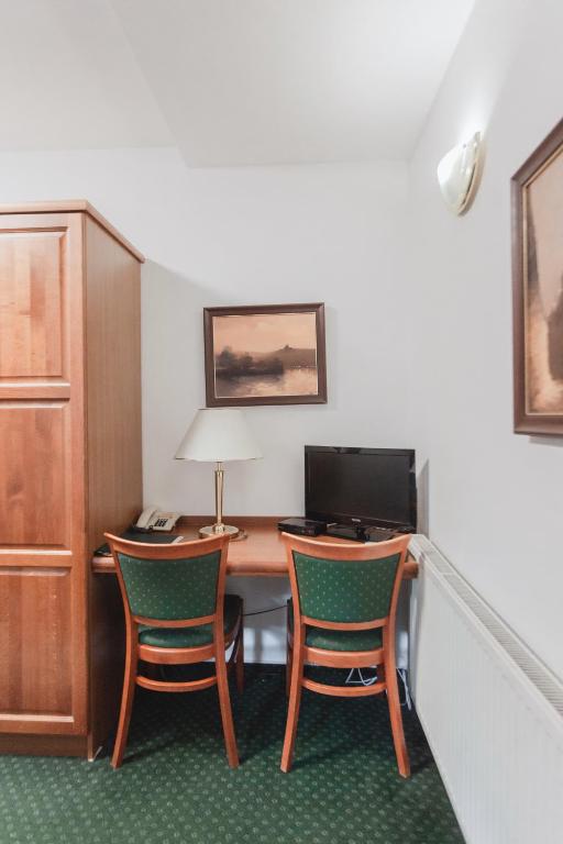 TV a/nebo společenská místnost v ubytování Hotel Peko