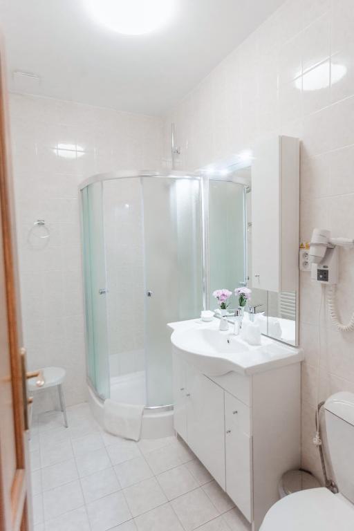 Koupelna v ubytování Hotel Peko