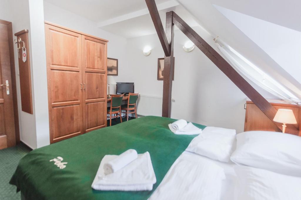Postel nebo postele na pokoji v ubytování Hotel Peko