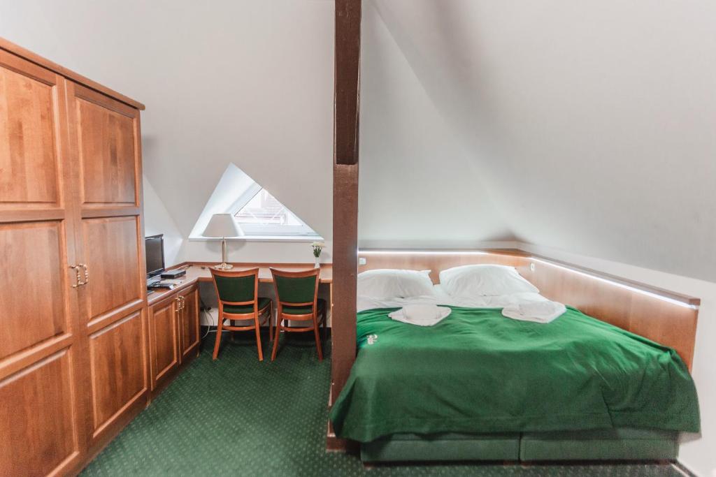 Postel nebo postele na pokoji v ubytování Hotel Peko