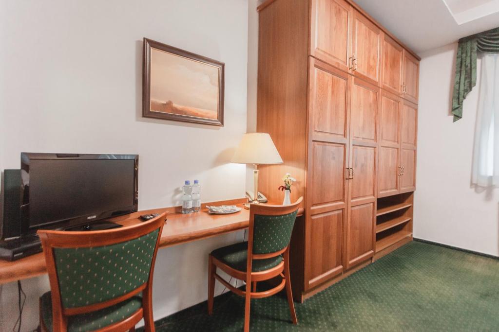 TV a/nebo společenská místnost v ubytování Hotel Peko