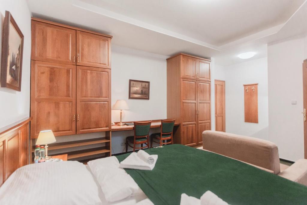 Postel nebo postele na pokoji v ubytování Hotel Peko