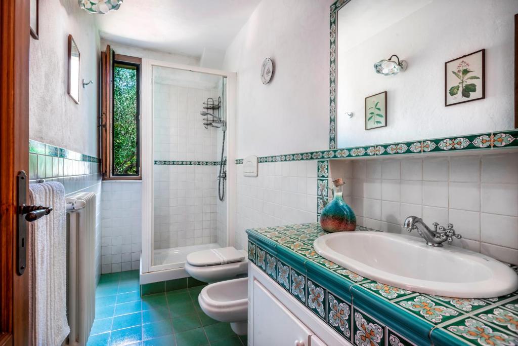 Koupelna v ubytování Agriturismo Borgo degli ulivi