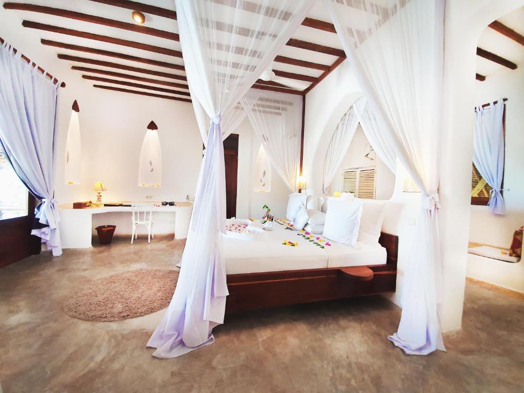 Postel nebo postele na pokoji v ubytování Boutique Hotel Matlai