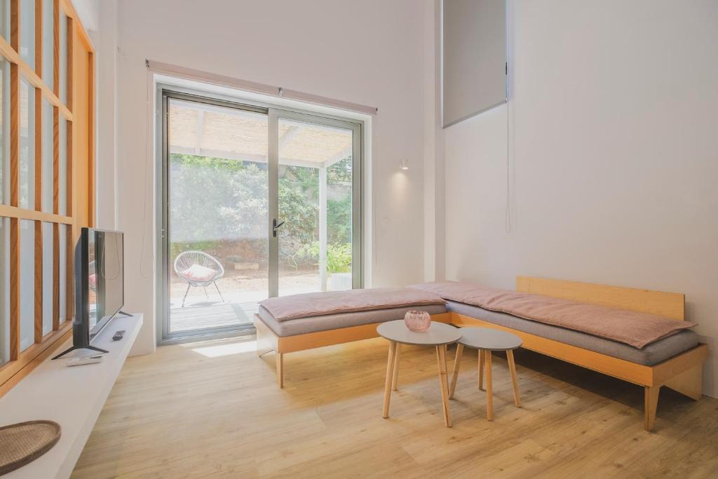 A seating area at Sun-splashed Stylish Flat, steps to City Old Town