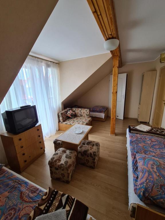 Postel nebo postele na pokoji v ubytování Ośrodek wczasowy Ewa