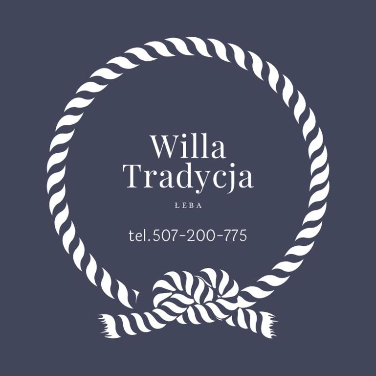 a wreath of rope with a bow on a blue background at Willa Tradycja in Łeba