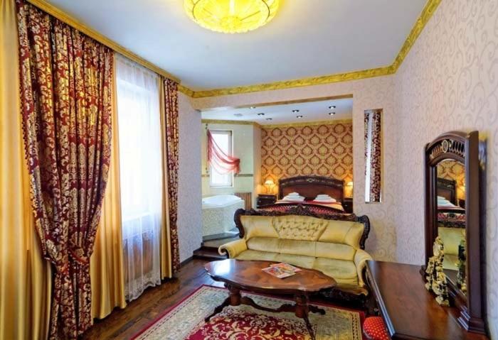 Postel nebo postele na pokoji v ubytování VICTOR Hotel Resort & SPA
