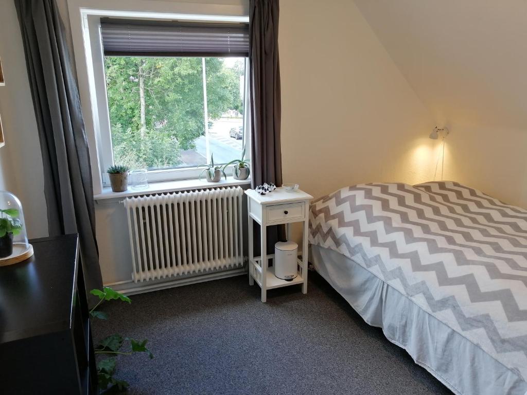 Postel nebo postele na pokoji v ubytování Bed and Breakfast i Struer