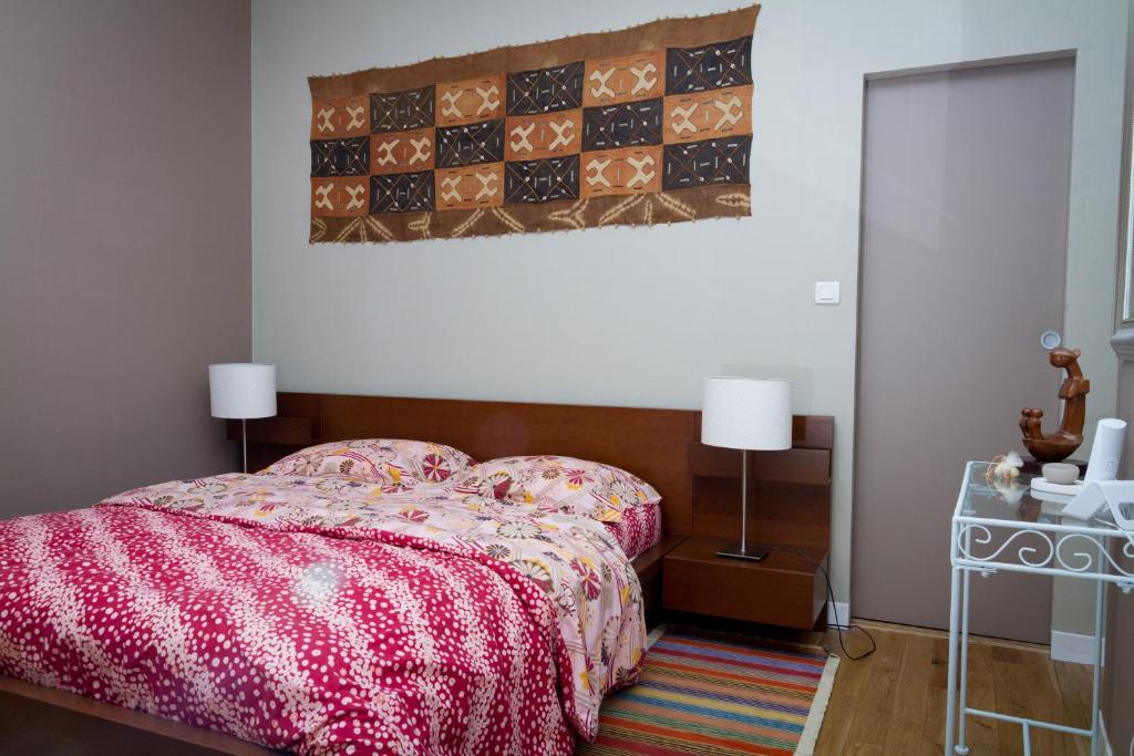 Tempat tidur dalam kamar di Appartement Rennel