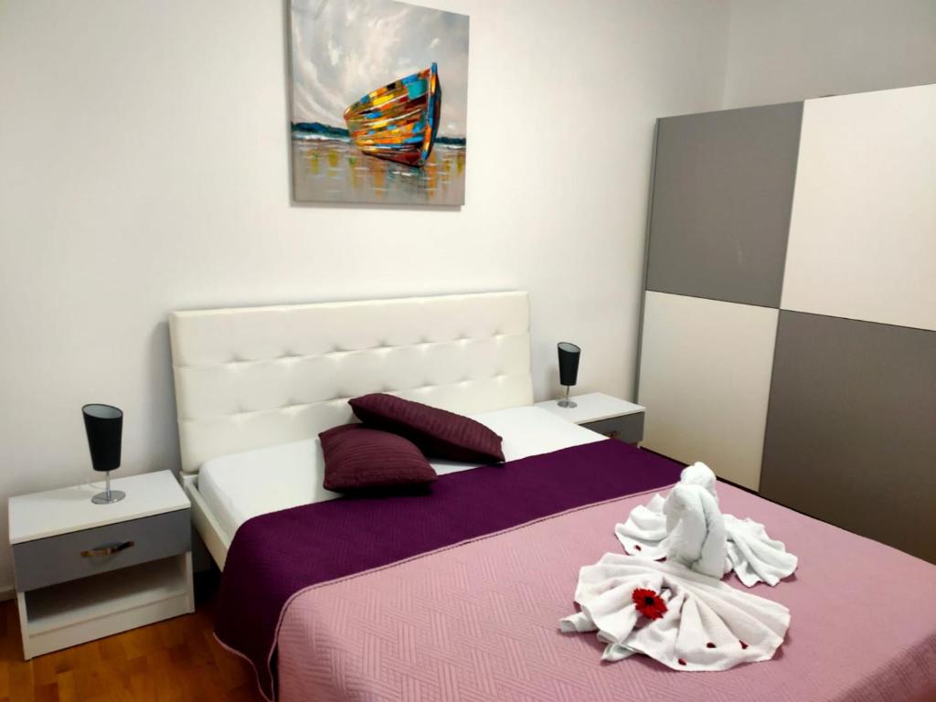 Posteľ alebo postele v izbe v ubytovaní Apartments Elin