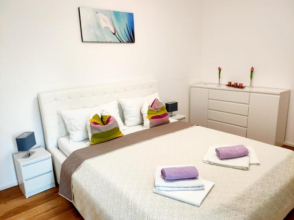 Posteľ alebo postele v izbe v ubytovaní Apartments Elin
