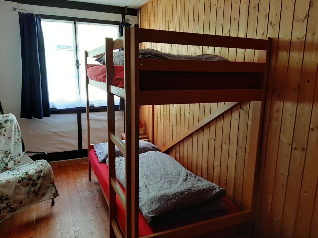 Postel nebo postele na pokoji v ubytování Hostel Rotschuo Jugend- und Familienferien