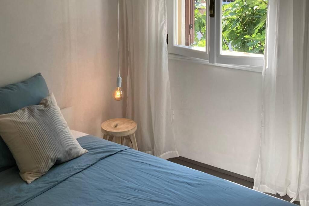 Posteľ alebo postele v izbe v ubytovaní Boutique apartment with beach within walking distance, near Tropea