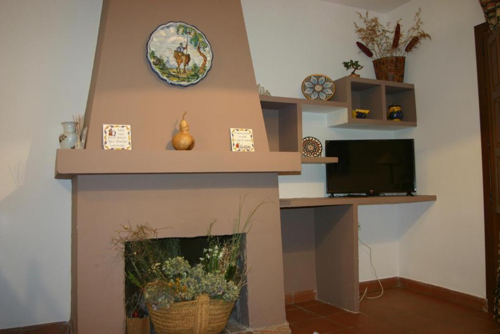 TV a/nebo společenská místnost v ubytování Apartamentos y Casas Rurales Las Terrazas de la Alpujarra