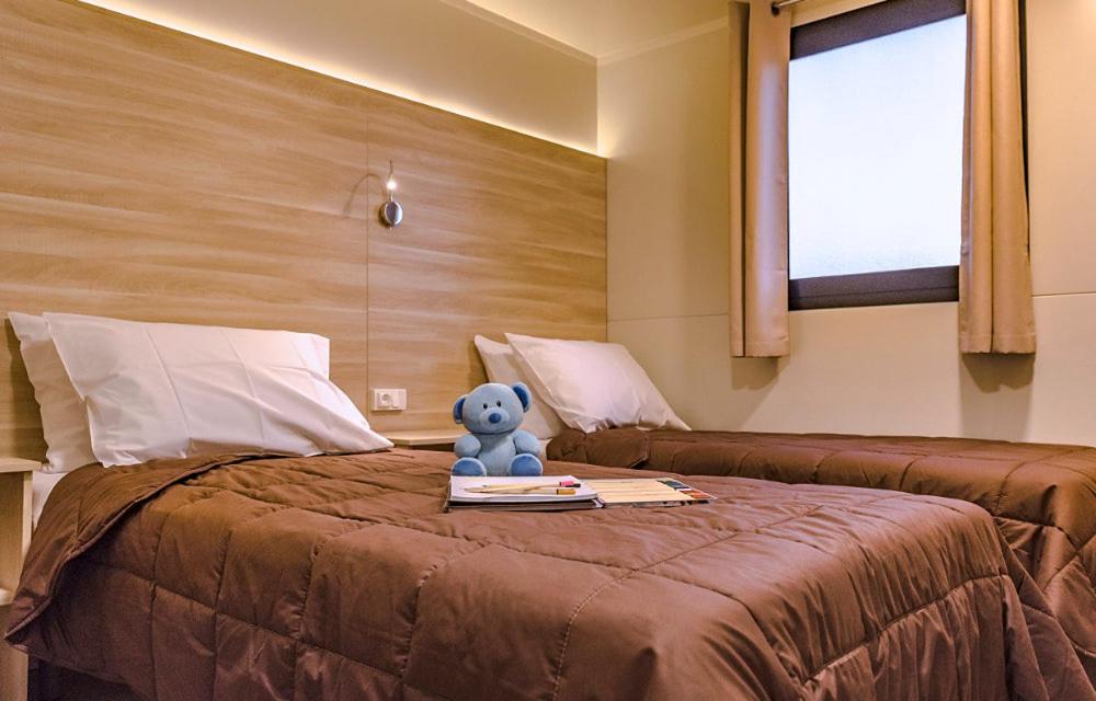 Postel nebo postele na pokoji v ubytování Rubina Resort