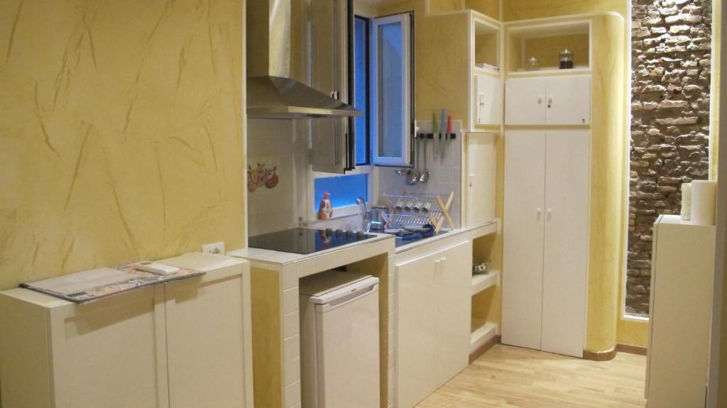 Kuchyňa alebo kuchynka v ubytovaní B&B In Piazza