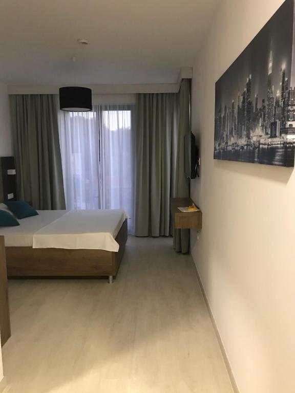 Кровать или кровати в номере REZEVICI BOUTIQUE VILLA