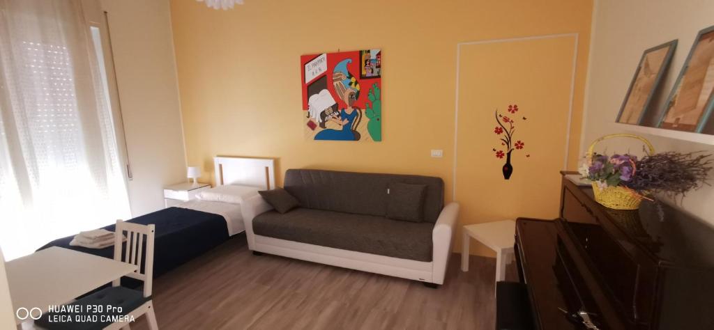 A bed or beds in a room at Il Pianoforte B&B