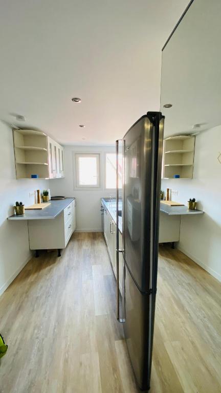 Kuchyň nebo kuchyňský kout v ubytování Neuf et cosy à Barr, route des vins