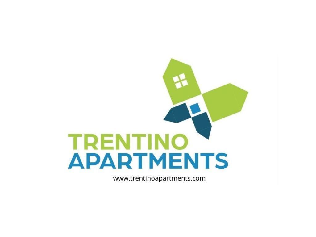 a logo for a triathlon appments website at Trentino Apartments - Casa Aurora in Folgaria