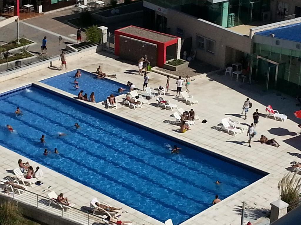 an overhead view of a swimming pool with people in it at Exclusive Tour Cordoba in Córdoba