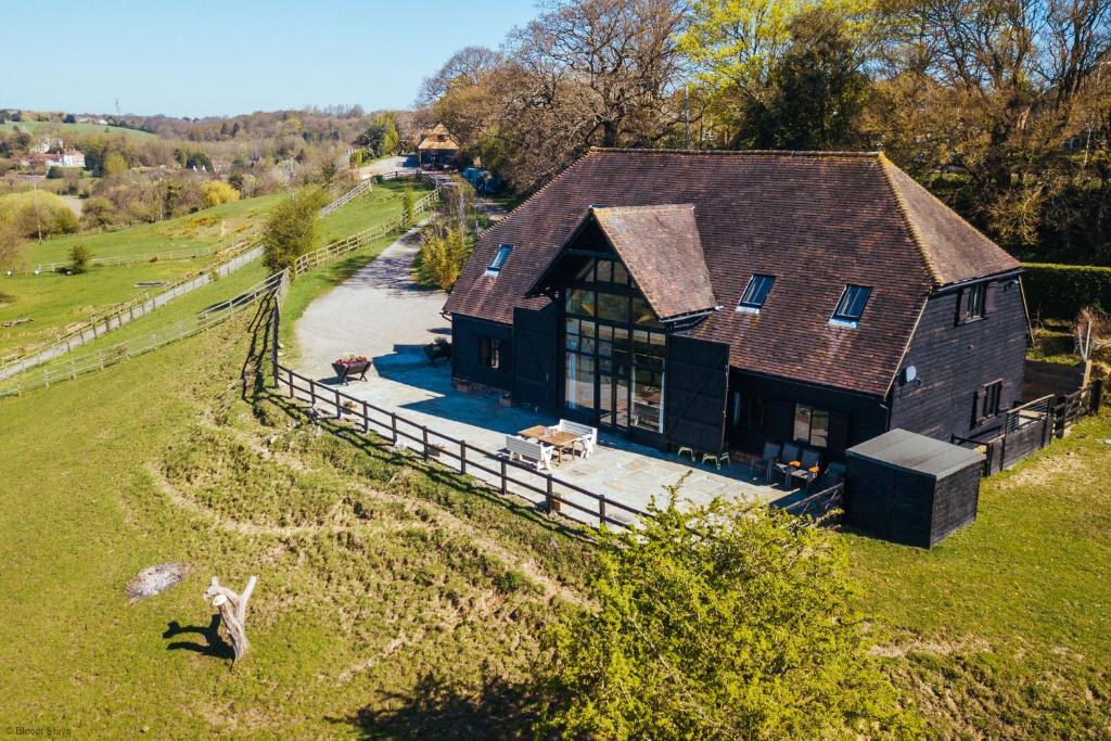 an aerial view of a house on a hill at The Canterbury Barn by Bloom Stays in Canterbury