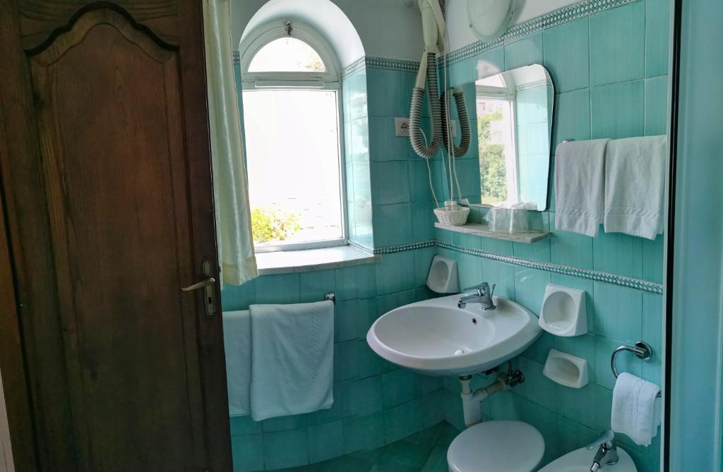 Koupelna v ubytování Hotel Dimora Fornillo