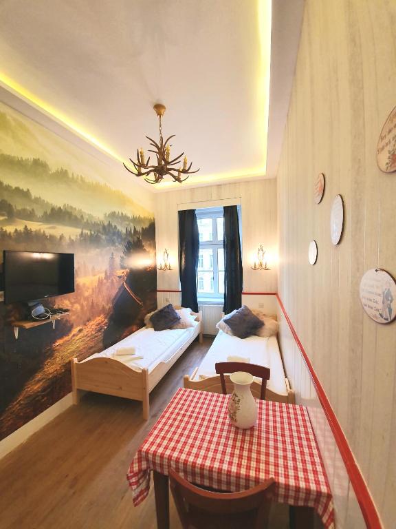Postel nebo postele na pokoji v ubytování Urban Boutique Hotel