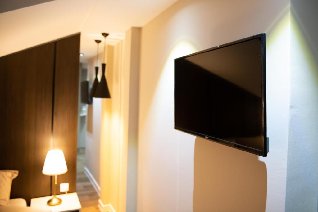 TV a/nebo společenská místnost v ubytování Apartmani Jović