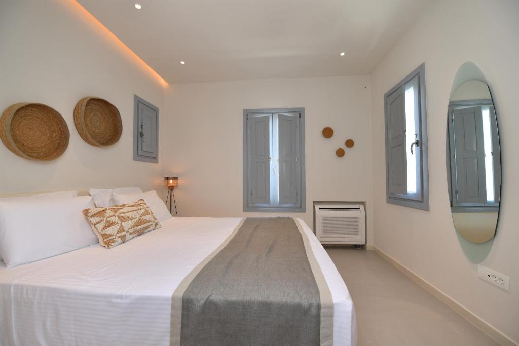 Postel nebo postele na pokoji v ubytování Nova Luxury Suites