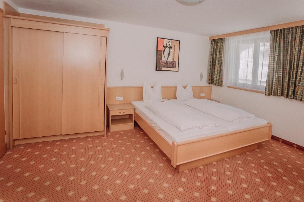 Postel nebo postele na pokoji v ubytování Gasthof Haidbach