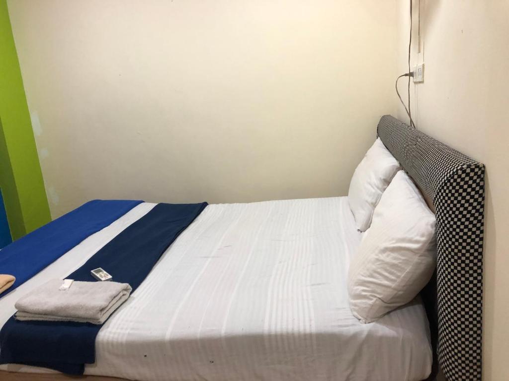 Cama o camas de una habitación en OYO 1146 Paris In Bangkok