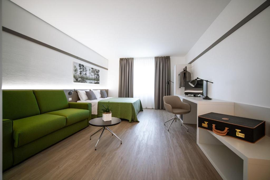 TV a/nebo společenská místnost v ubytování Bonotto Hotel Palladio