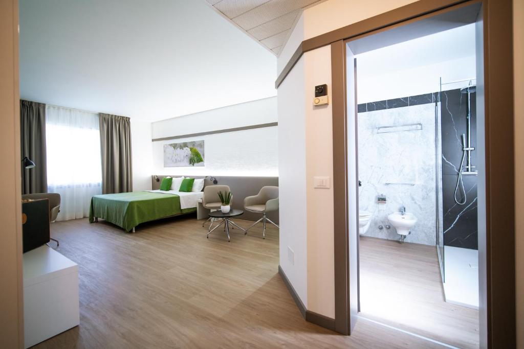 Postel nebo postele na pokoji v ubytování Bonotto Hotel Palladio