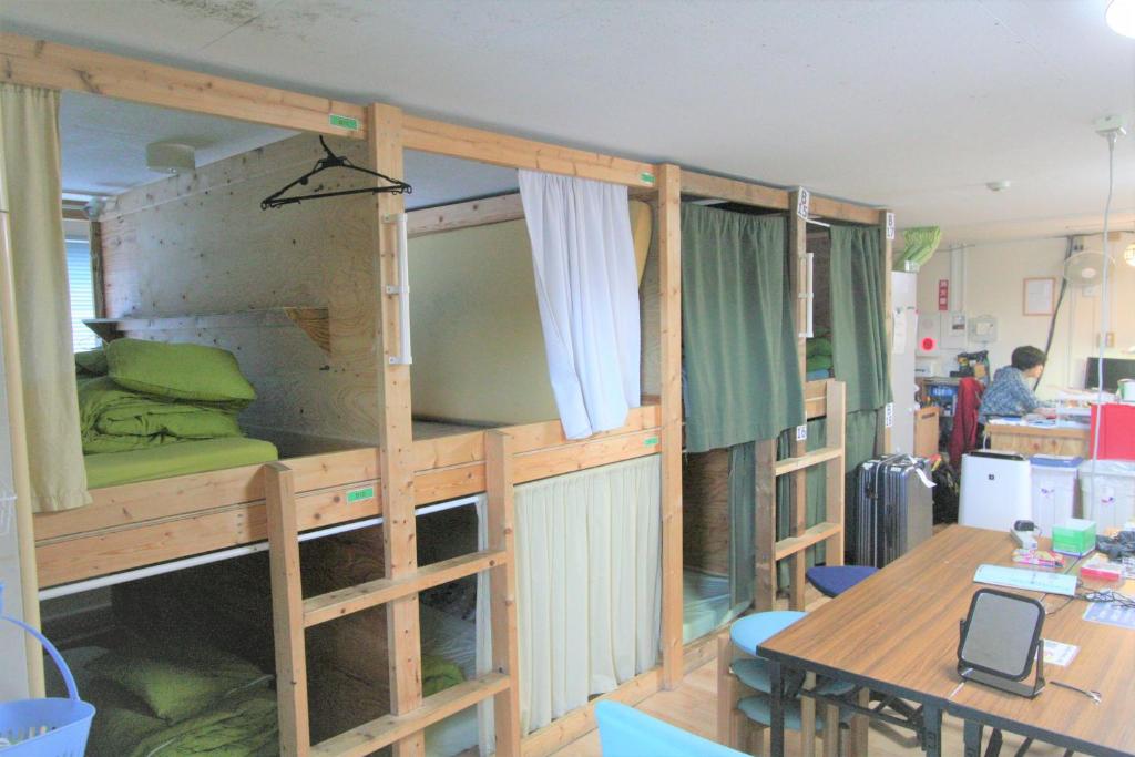 Postel nebo postele na pokoji v ubytování Edo Tokyo Hostel