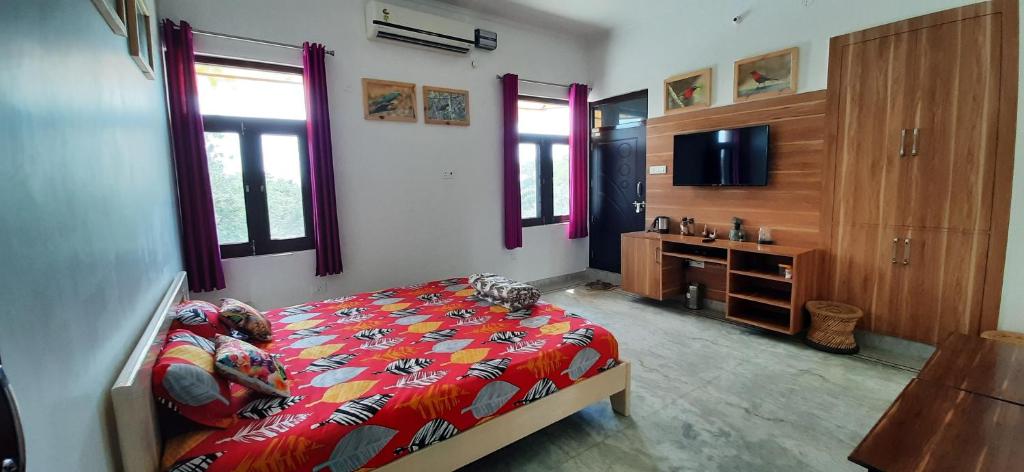 TV a/nebo společenská místnost v ubytování IbisHouse Farm Stay