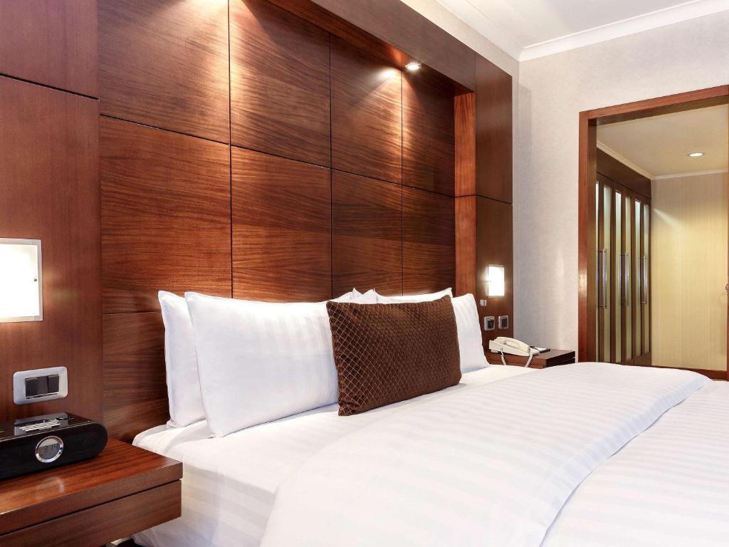 Postel nebo postele na pokoji v ubytování Swissotel Quito