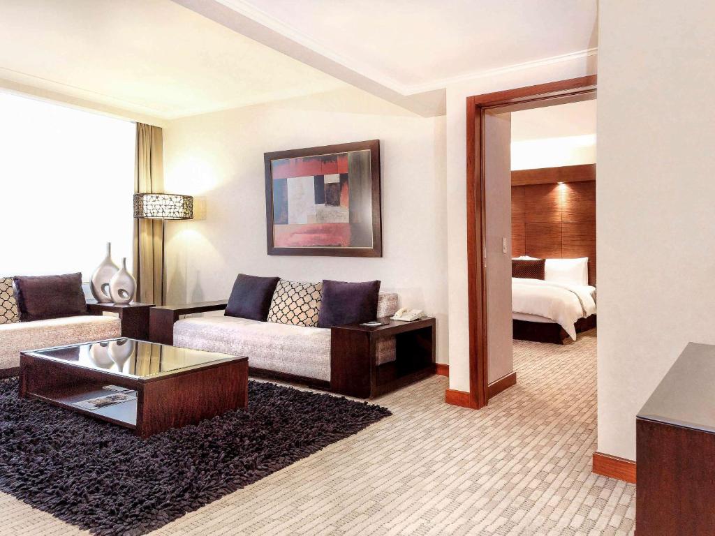 Postel nebo postele na pokoji v ubytování Swissotel Quito