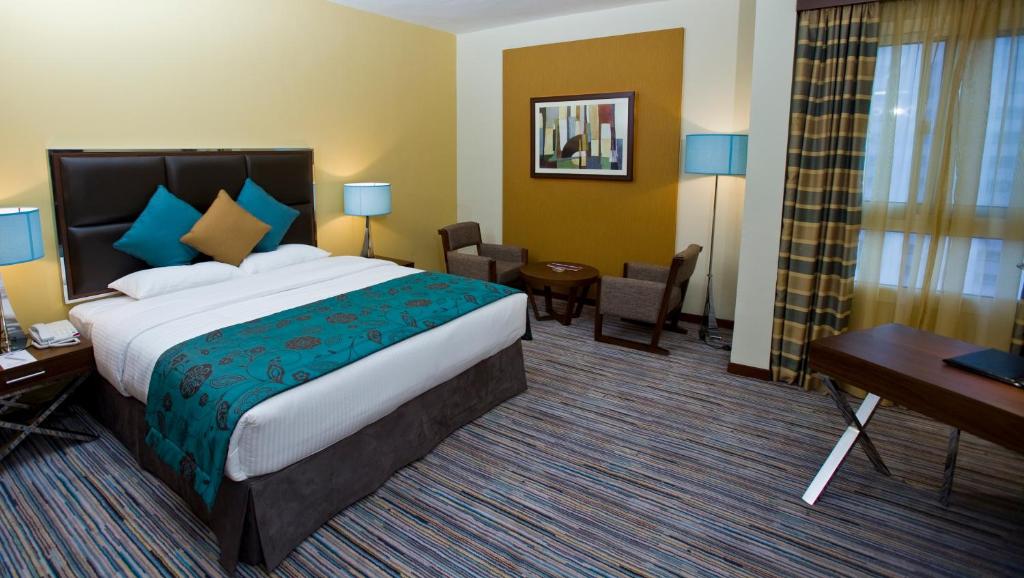 Cama ou camas em um quarto em Phoenix Plaza Hotel Apartments