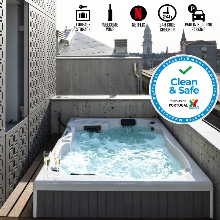 a jacuzzi tub on the roof of a building with the clean at PortoSoul Trindade in Porto